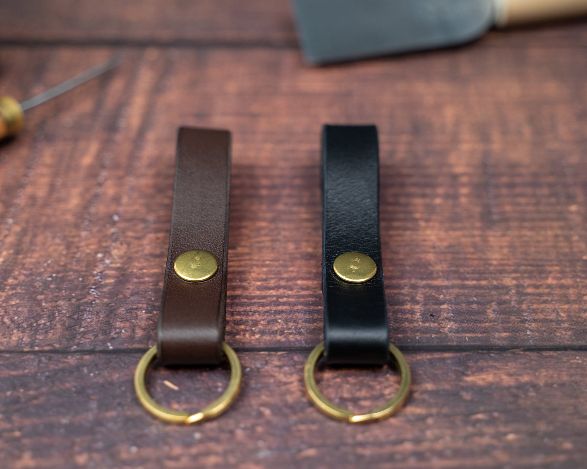 Dark brown and black leather looped keyrings side by side