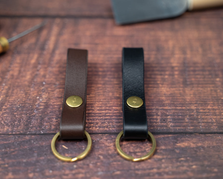 Dark brown and black leather looped keyrings side by side
