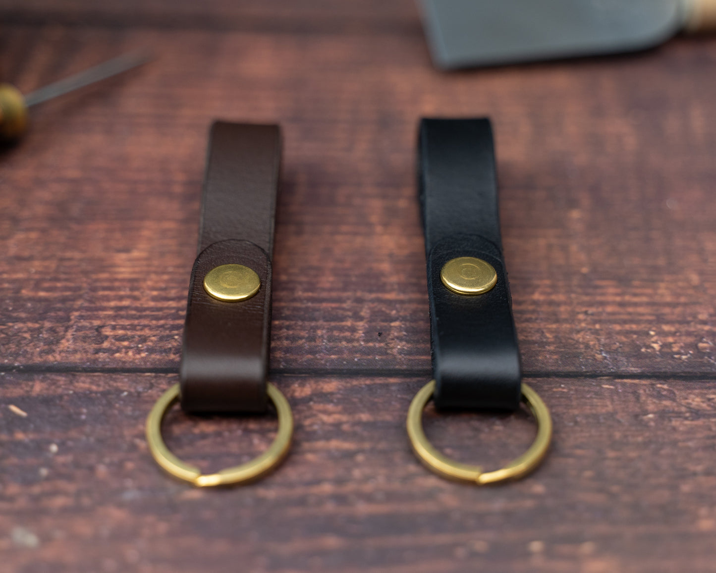 Dark brown and black leather looped keyrings side by side