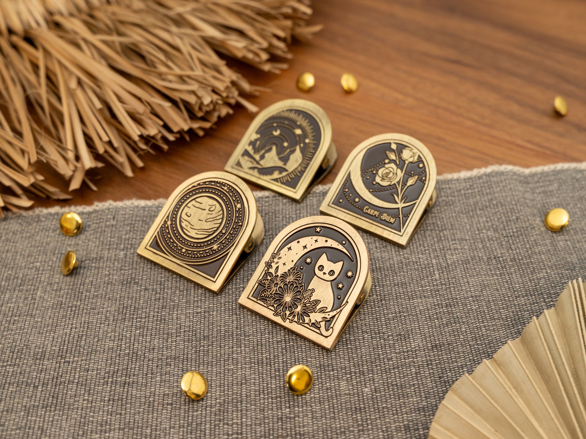 Vintage antique brass metal journal book clips in four designs - cat over a moon, planet solar system, rose, mountains