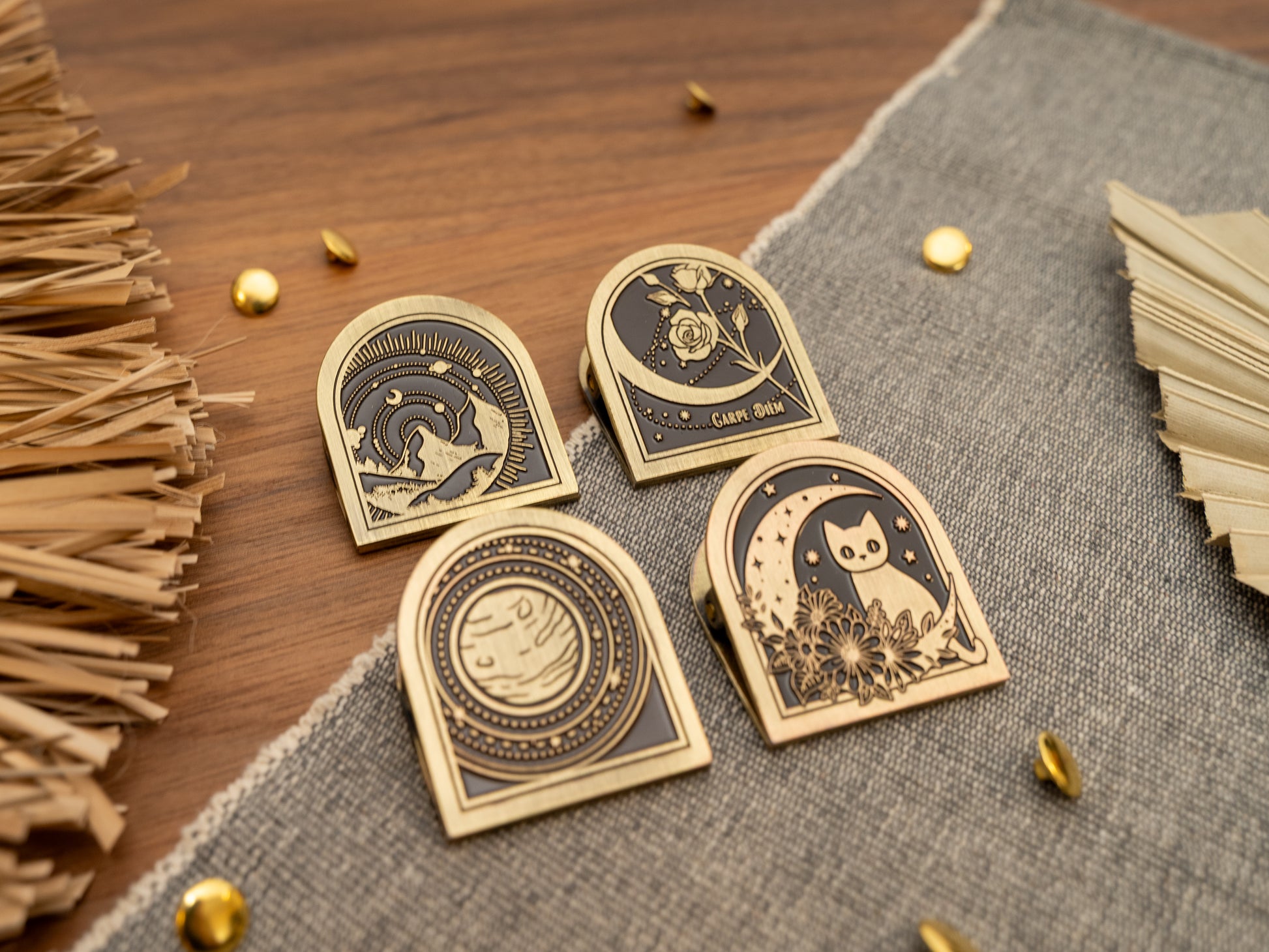 Vintage antique brass metal journal book clips in four designs - cat over a moon, planet solar system, rose, mountains