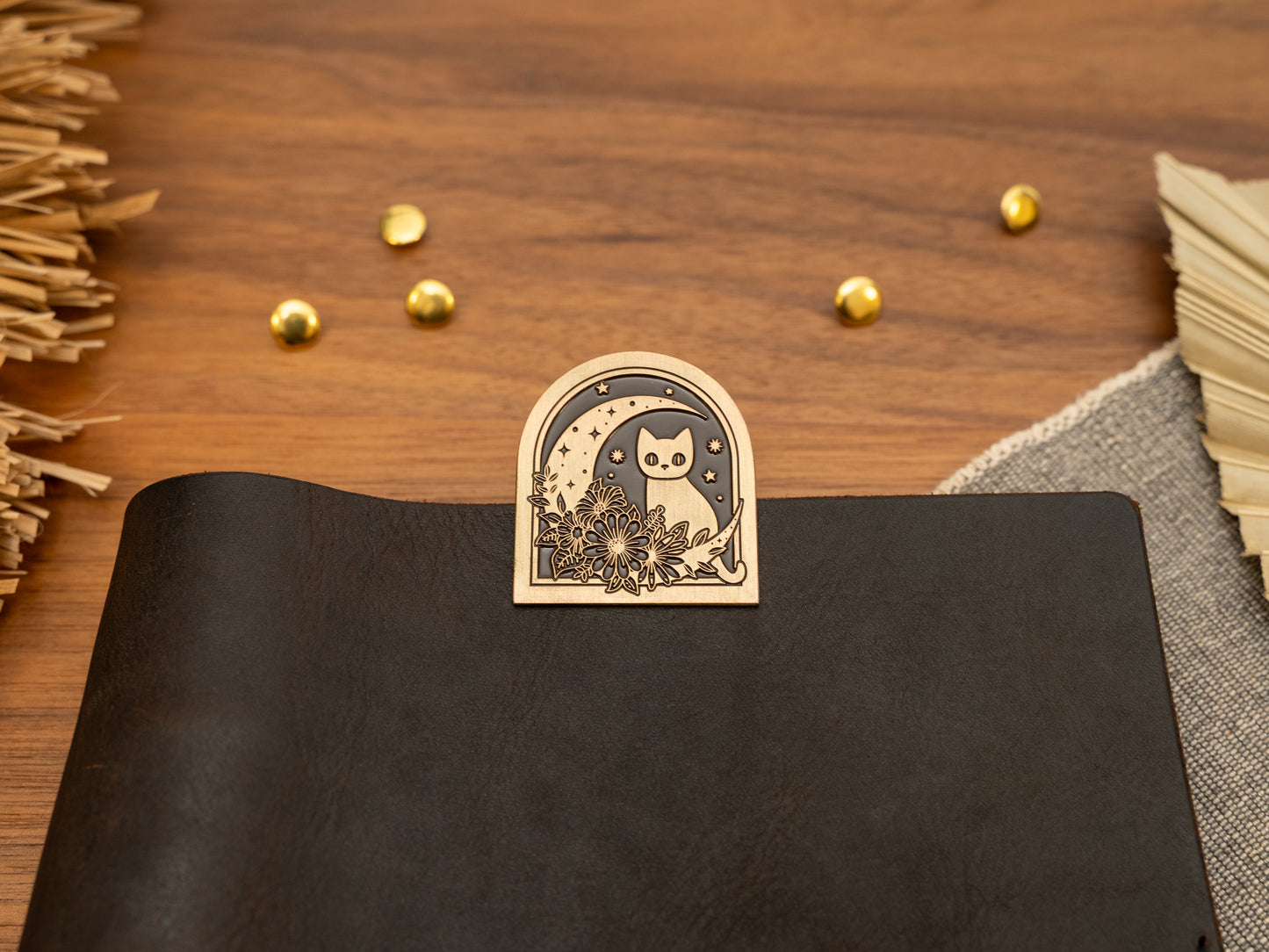 Vintage antique brass metal journal book clips with a cat in flowers next to a moon design