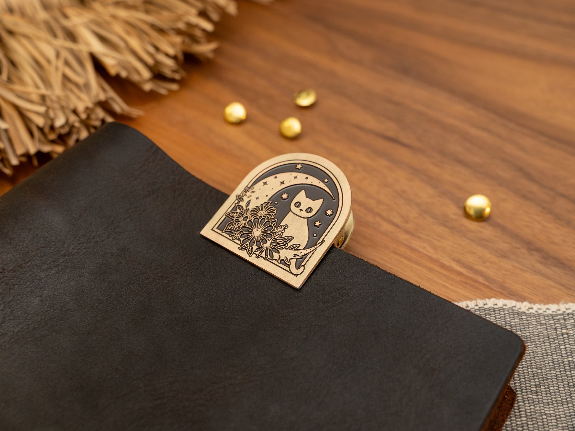 Vintage antique brass metal journal book clips with a cat in flowers next to a moon design