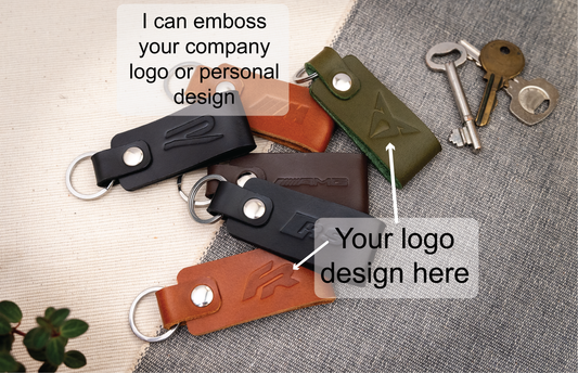 Mixture of blank keyrings in black, tan, olive green, purple, red, navy blue and dark brown. Can be stamped with custom logos such as car logos, company logos. Available in several colours with stainless steel or brass hardware.